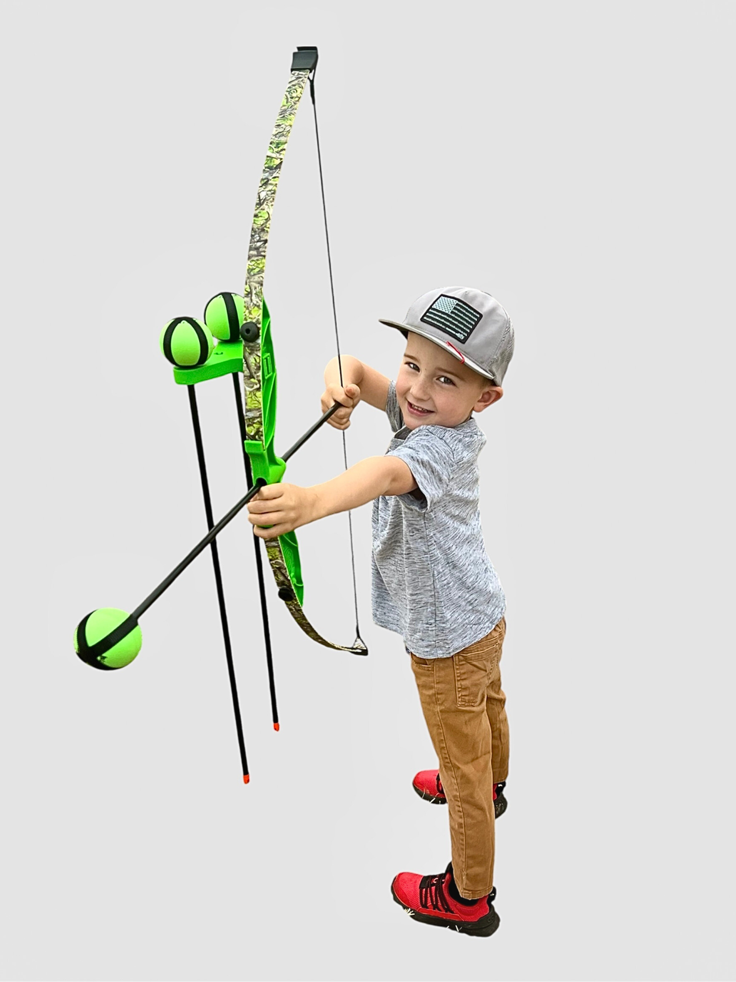 child holding toy bow and arrow